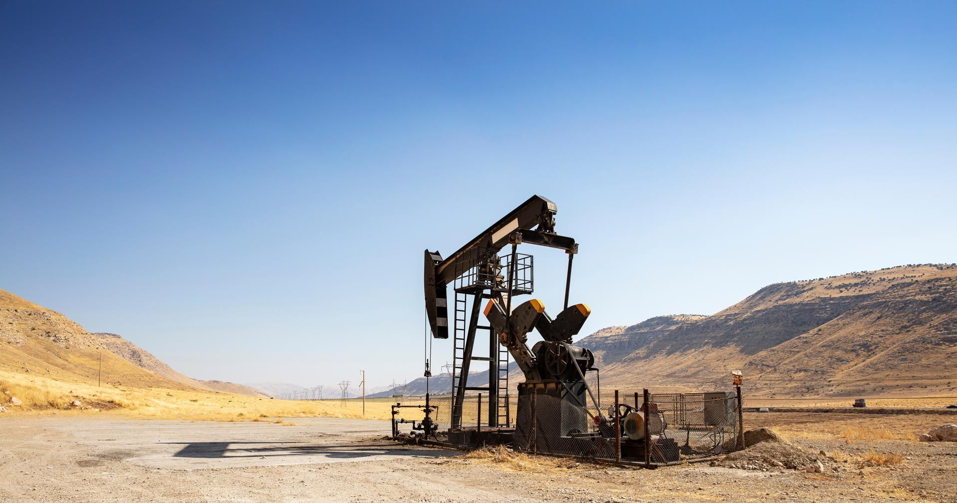 Professional well drilling contractor operating drilling equipment at a residential well site. Professional well drilling contractor operating drilling equipment at a residential well site.