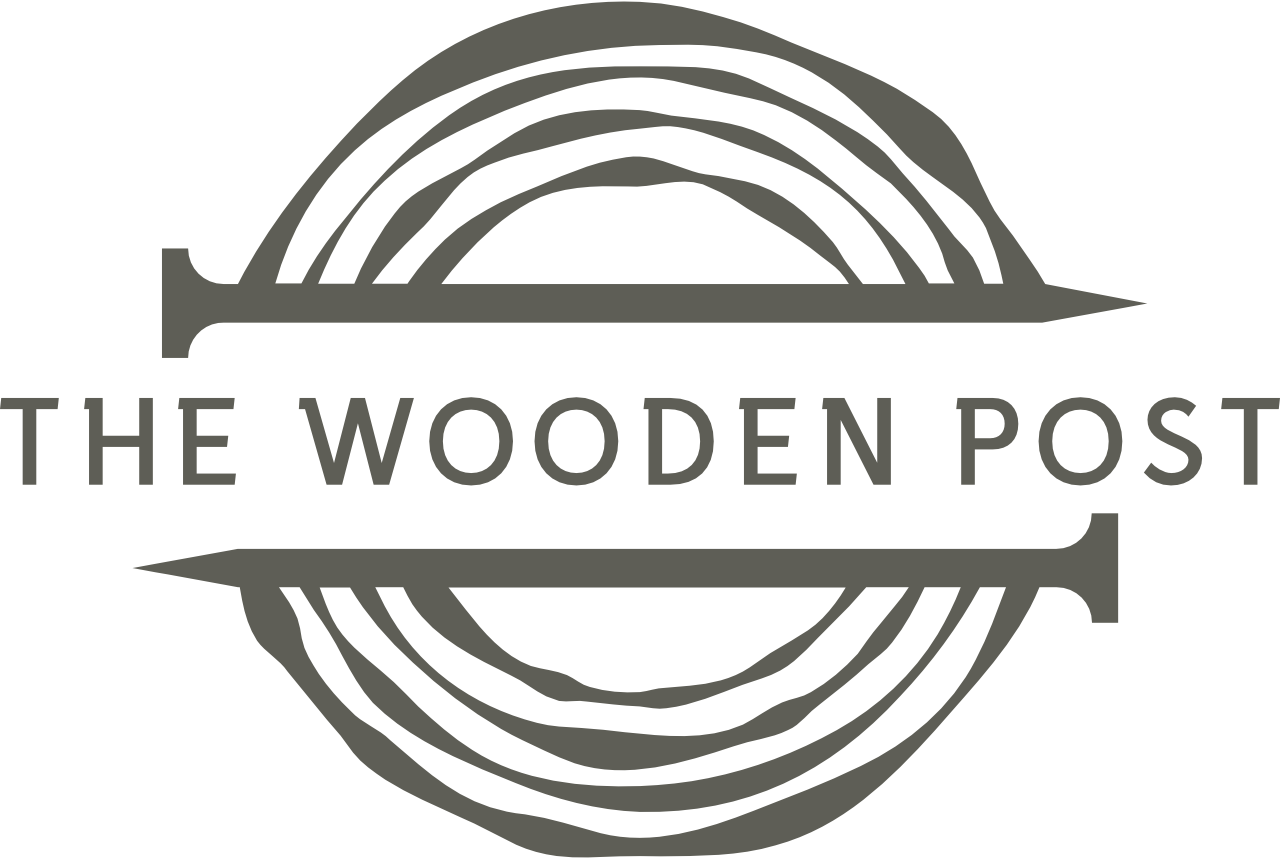 The Wooden Post logo with gray circular wood-grain rings and text across the center