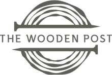The Wooden Post logo with gray circular wood-grain rings and text across the center