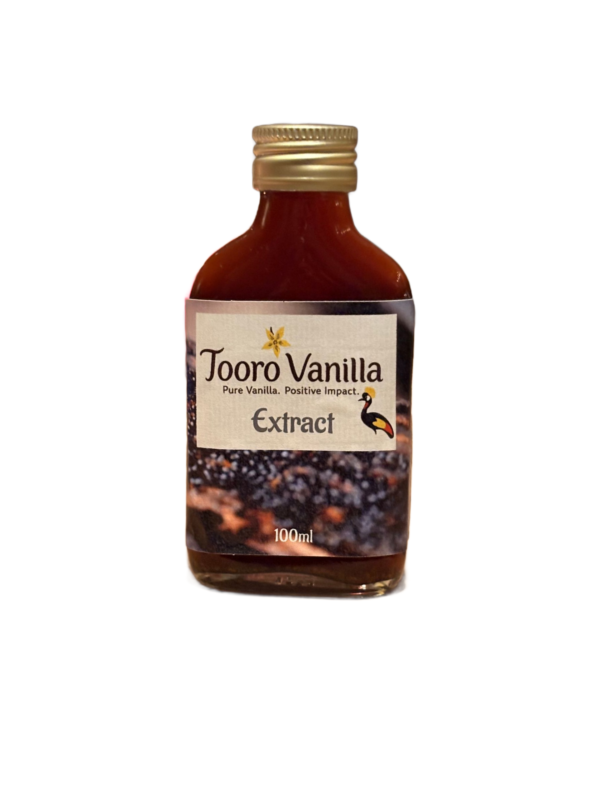 Bottle of Tooro Vanilla extract, dark liquid, label with logo and text.
