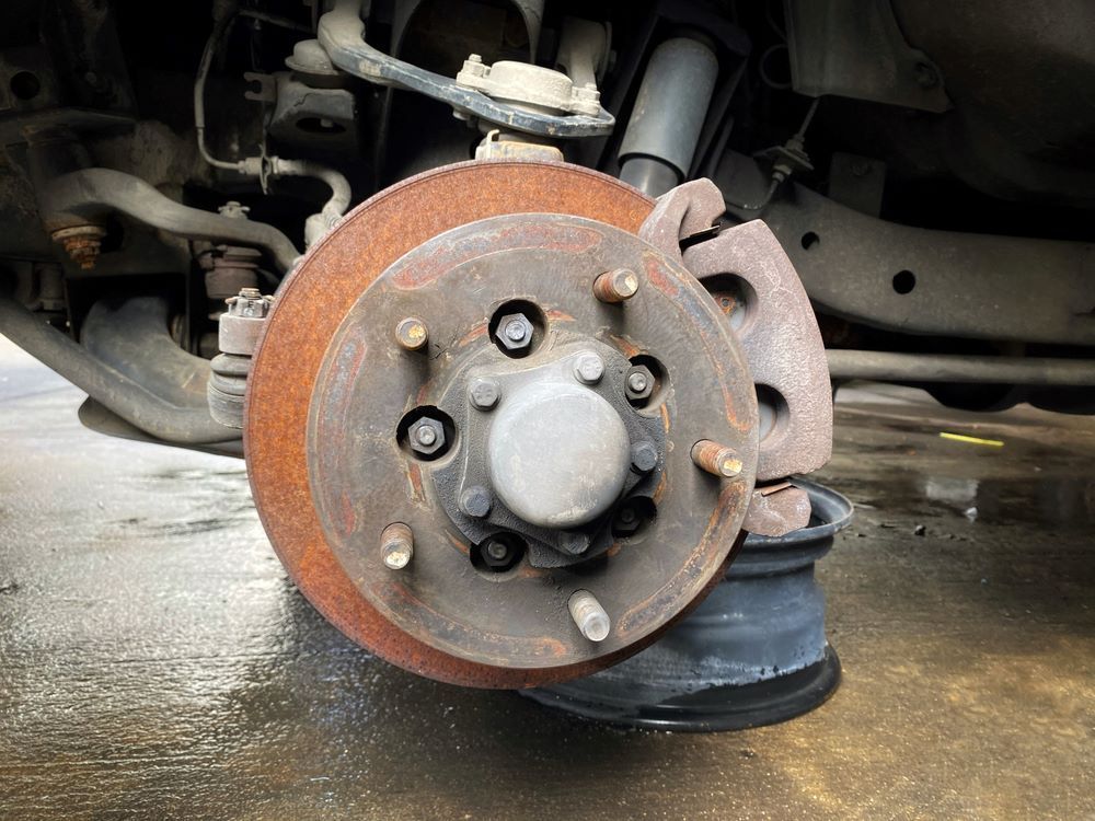 A Close Up of a Rusty Brake Disc — C J Mechanical in Berry, NSW