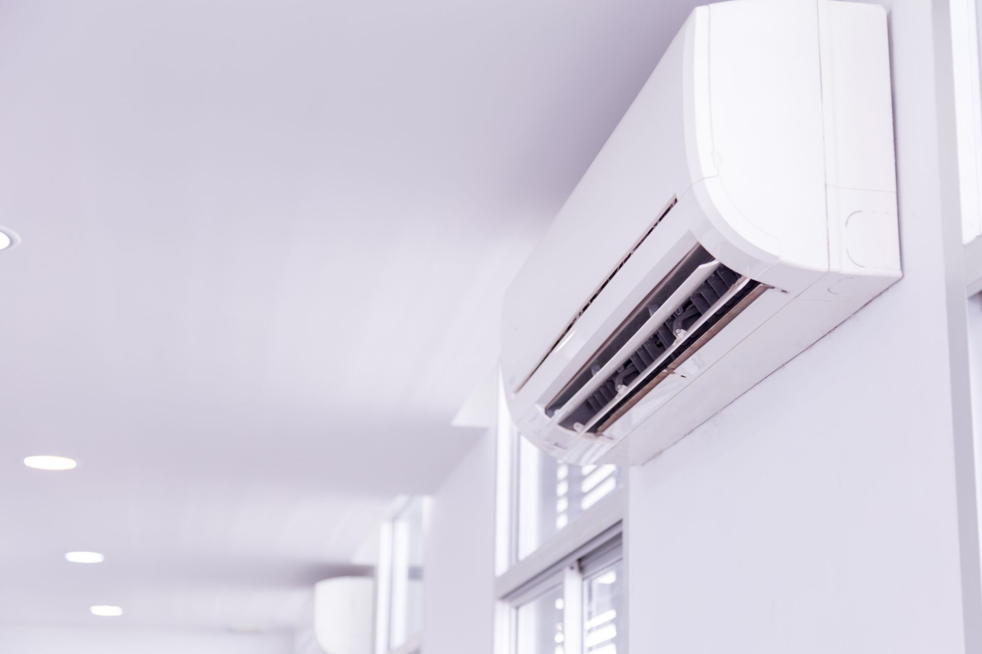 White Air Conditioning Unit Mounted — Climate King In Orange, NSW