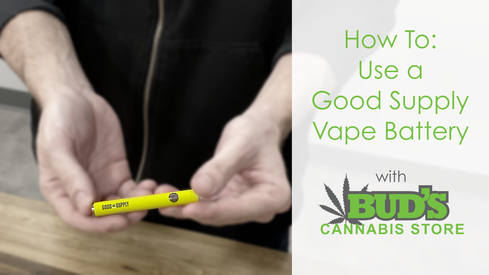 Person holding yellow vape pen; text 