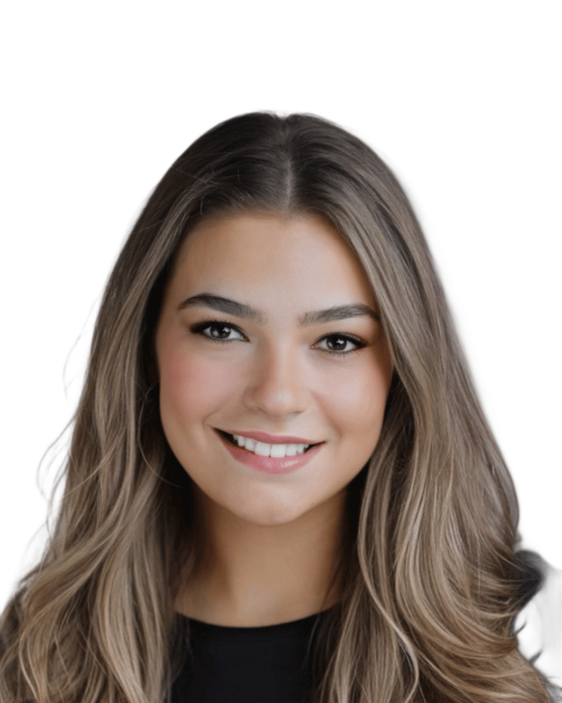 A headshot of a person with long, wavy, light brown hair against a white background.