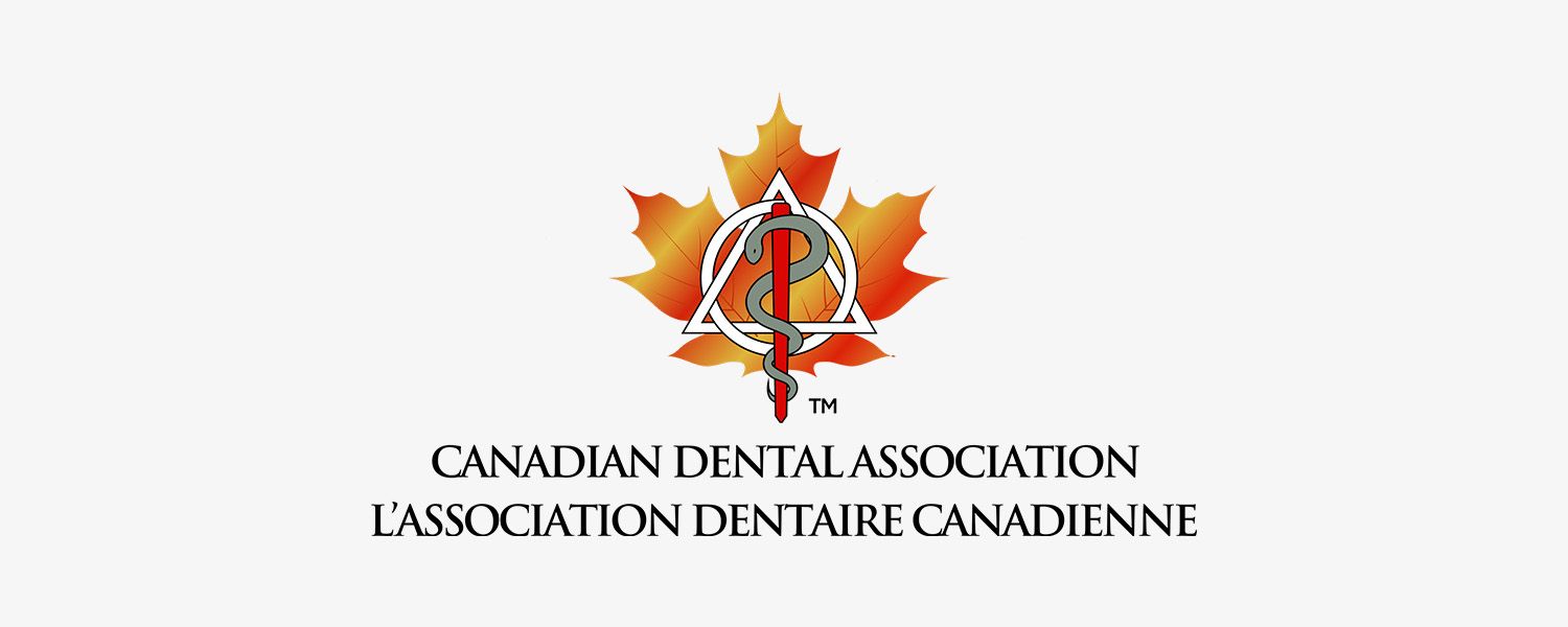 The logo for the angel city dental society is black and yellow.