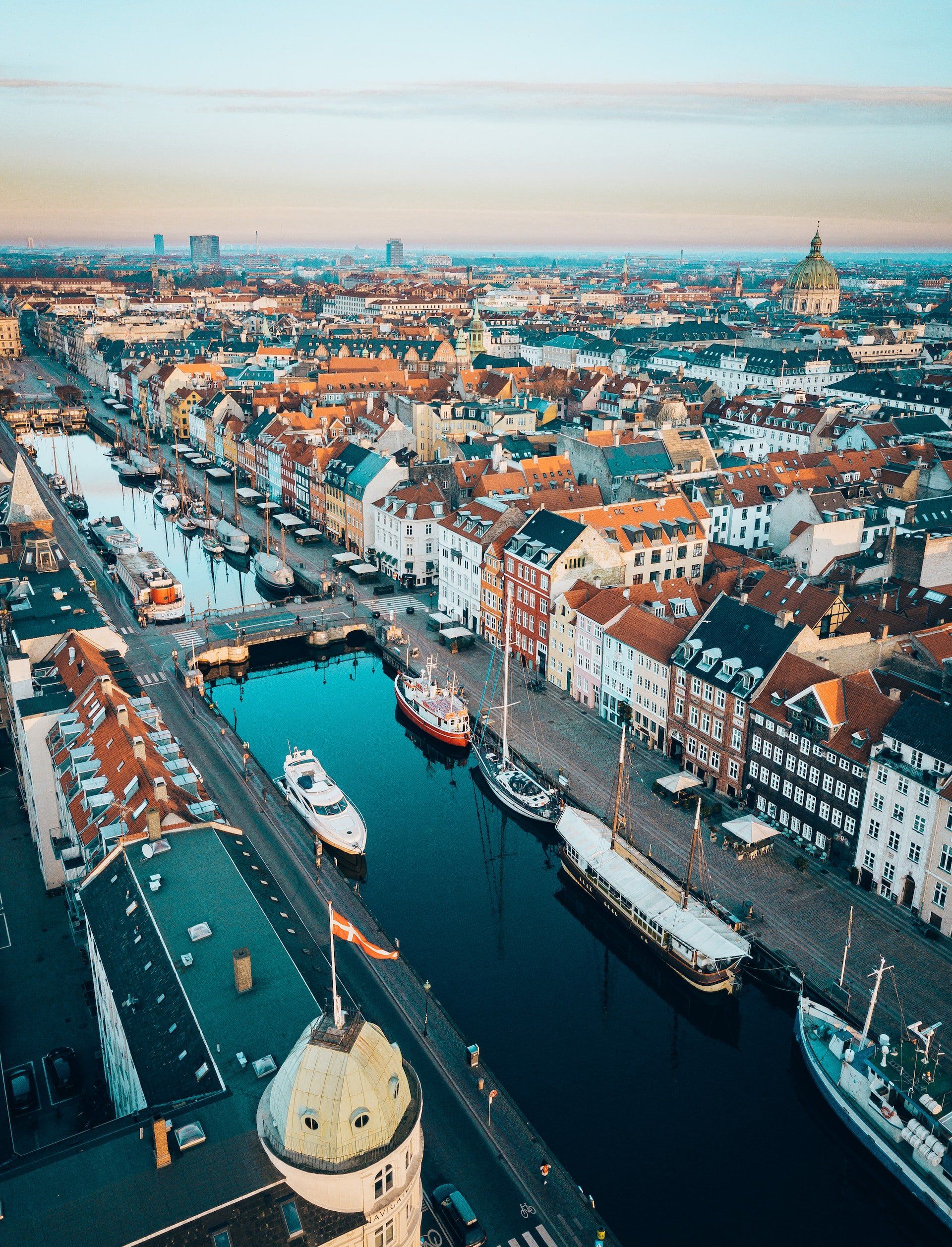 An aerial view of a city with a river running through it