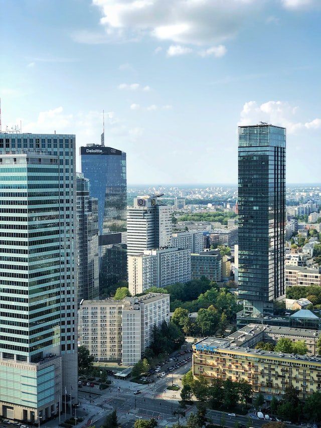 An aerial view of a city with a lot of tall buildings