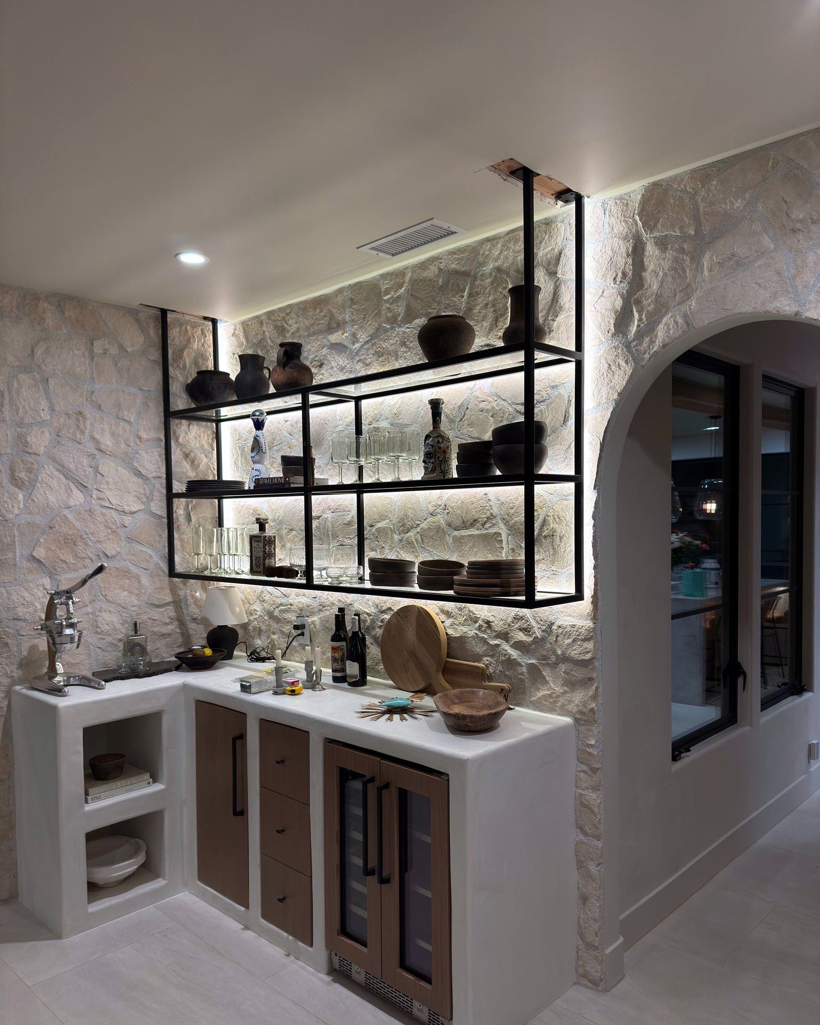 Floating backlit steel shelving