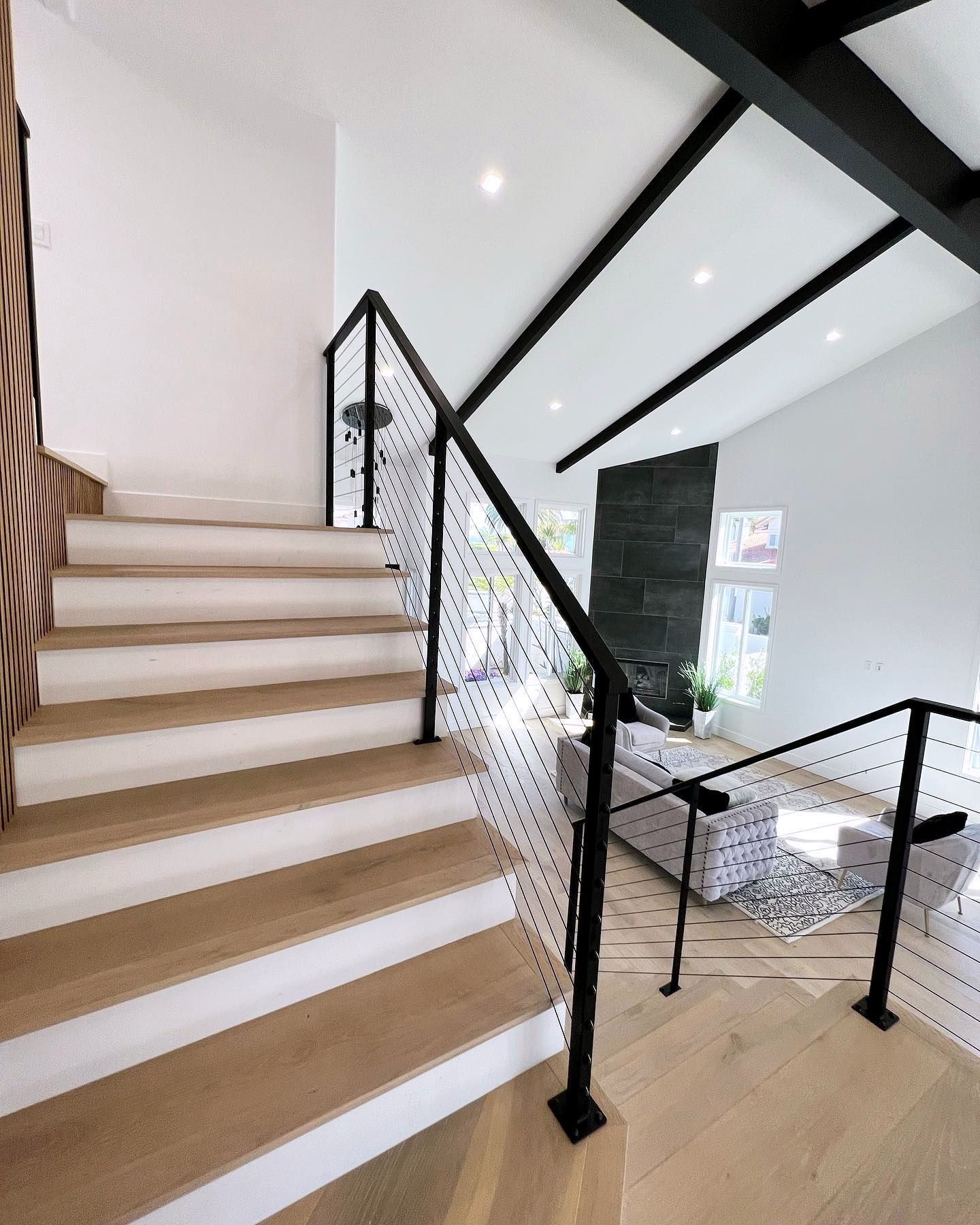 Black steel and cable stair railing