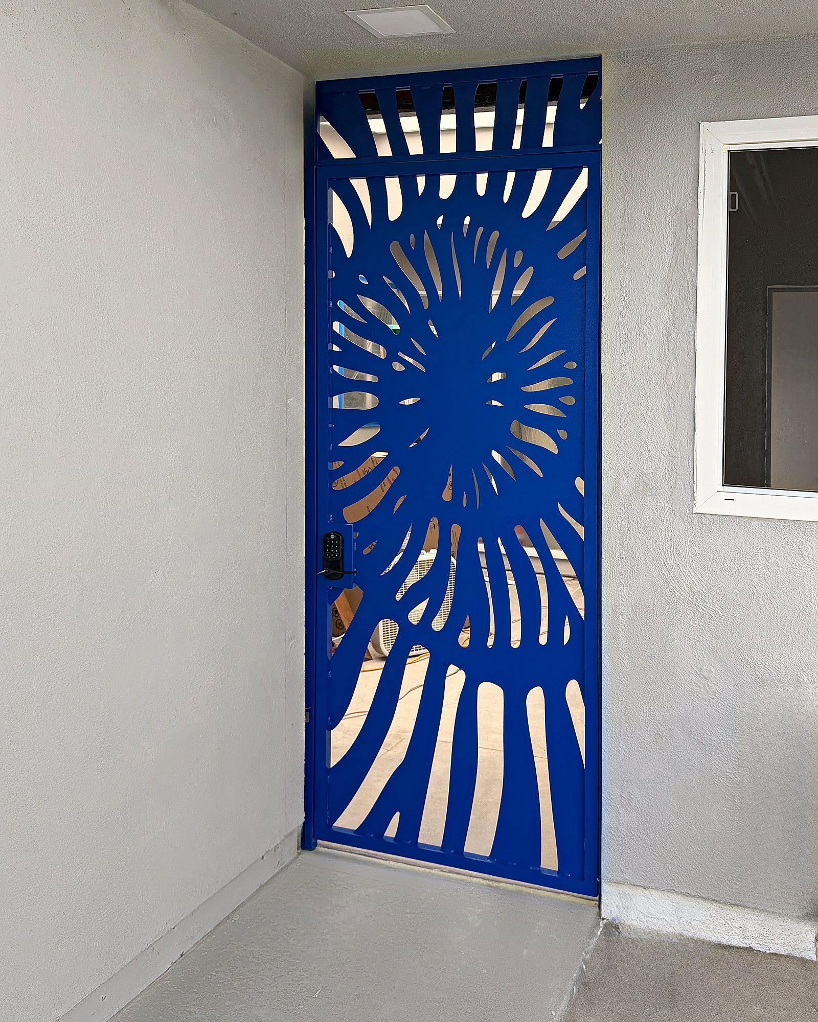 Custom cut-steel sunburst entry gate, Fallbrook