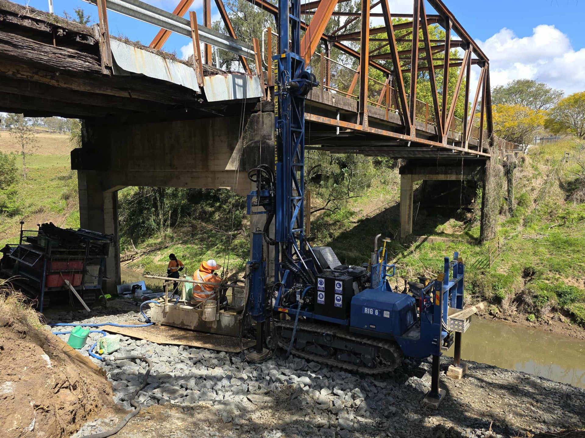 A Truck is Digging a Hole in the Ground — North Coast Drilling & Wicks in Bangalow, NSW