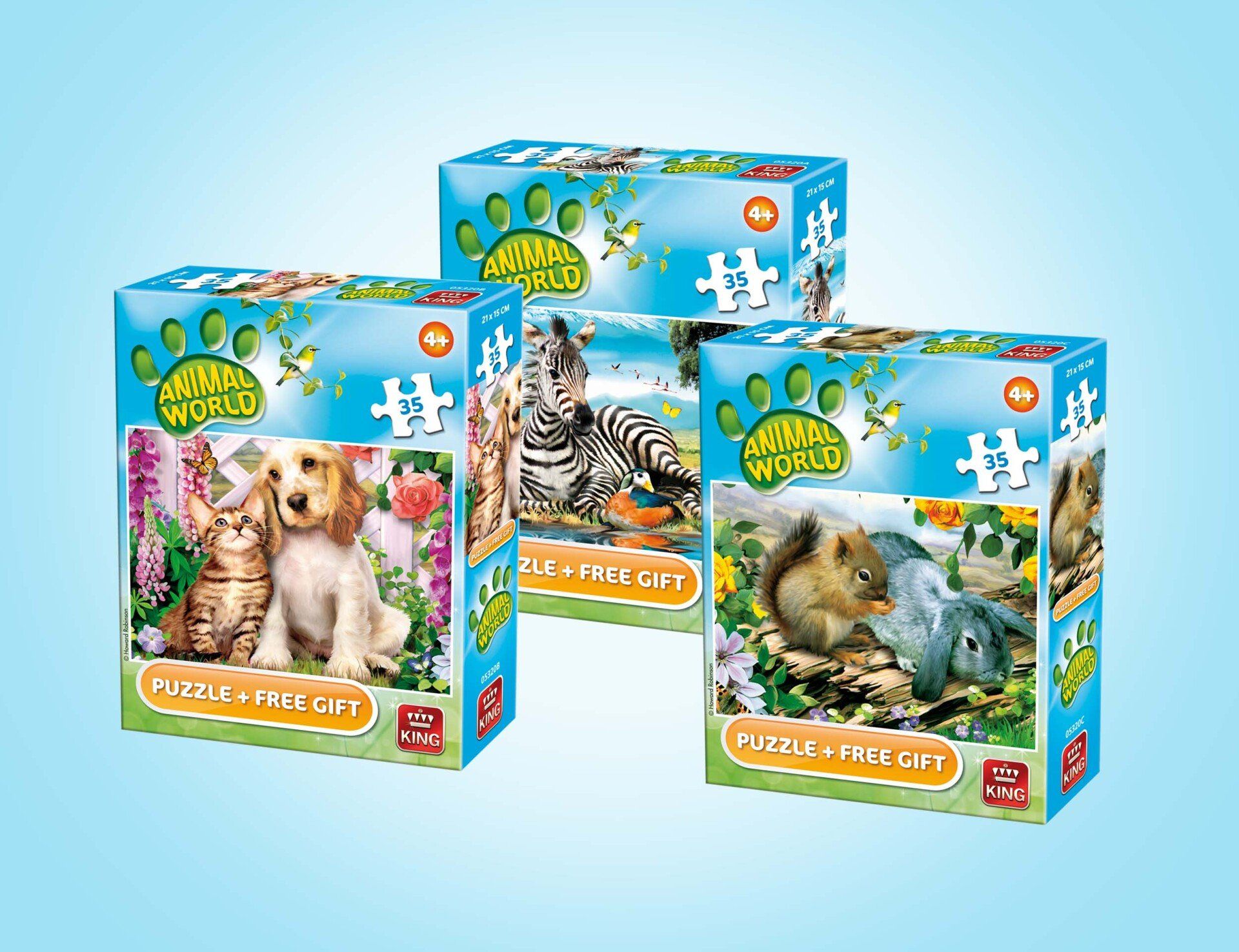 Drie dozen kinderpuzzels met afbeeldingen van dieren zoals een kat, hond, zebra en konijn tegen een blauwe achtergrond.
