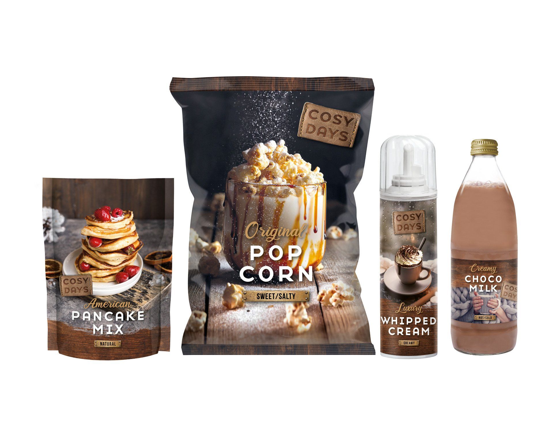 Vier voedingsproducten van het merk Cosy Days: pannenkoekenmix, popcorn, slagroom en chocolademelk, gerangschikt op een witte achtergrond.