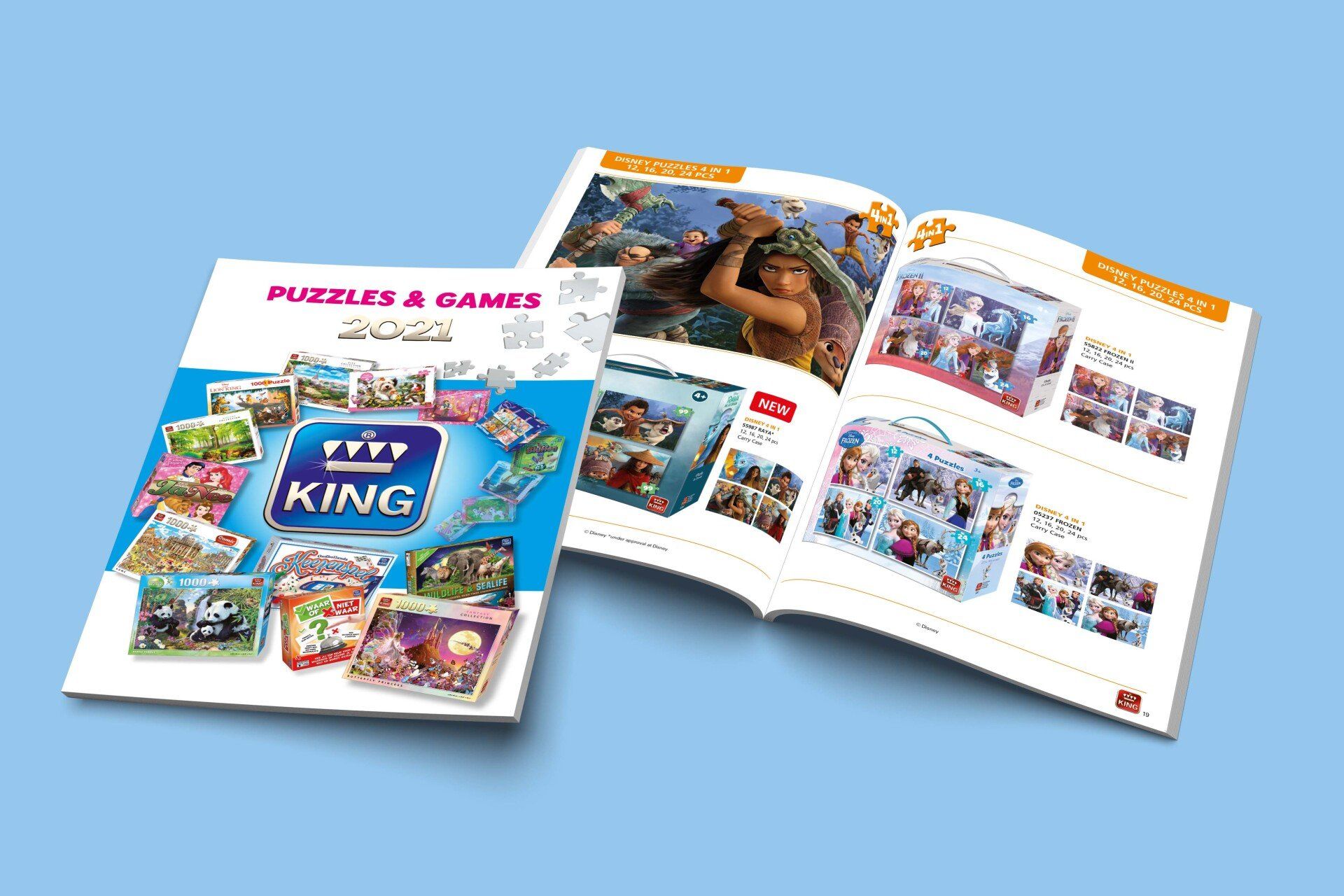 Een productcatalogus van het merk King met een omslag en een open pagina waarop diverse legpuzzels worden getoond.