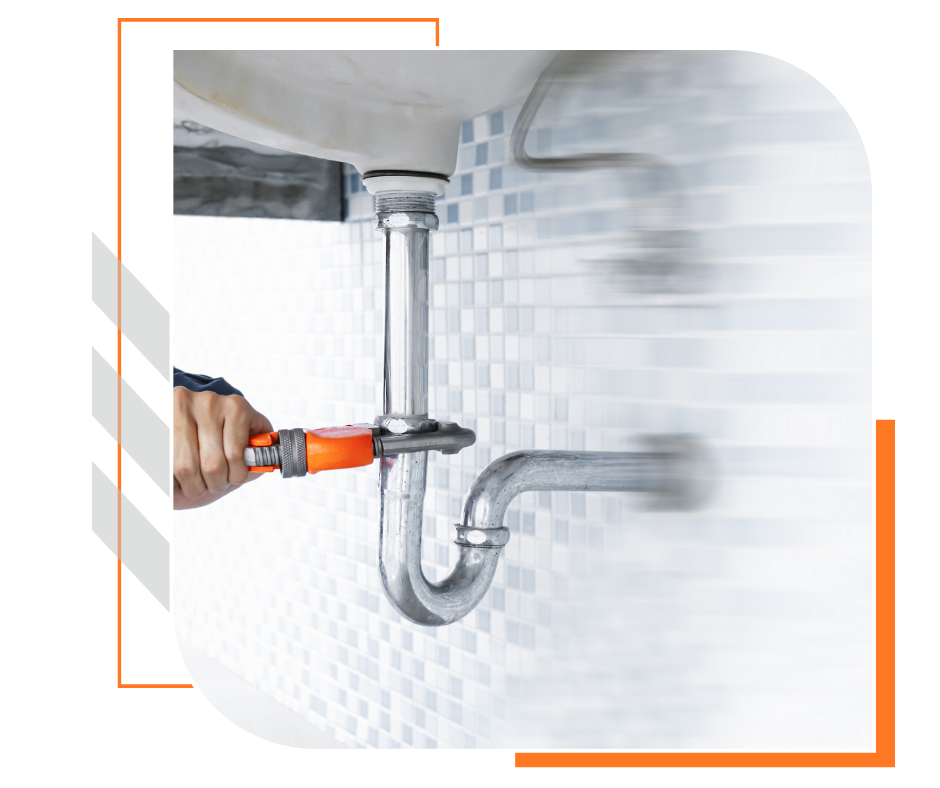 plumber working on residential bathroom sink