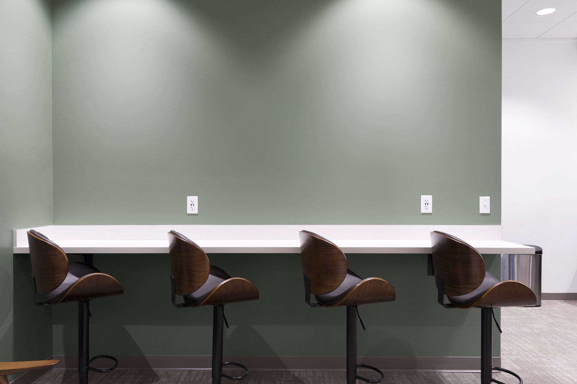 Bar seating in the reception room of the dental office.