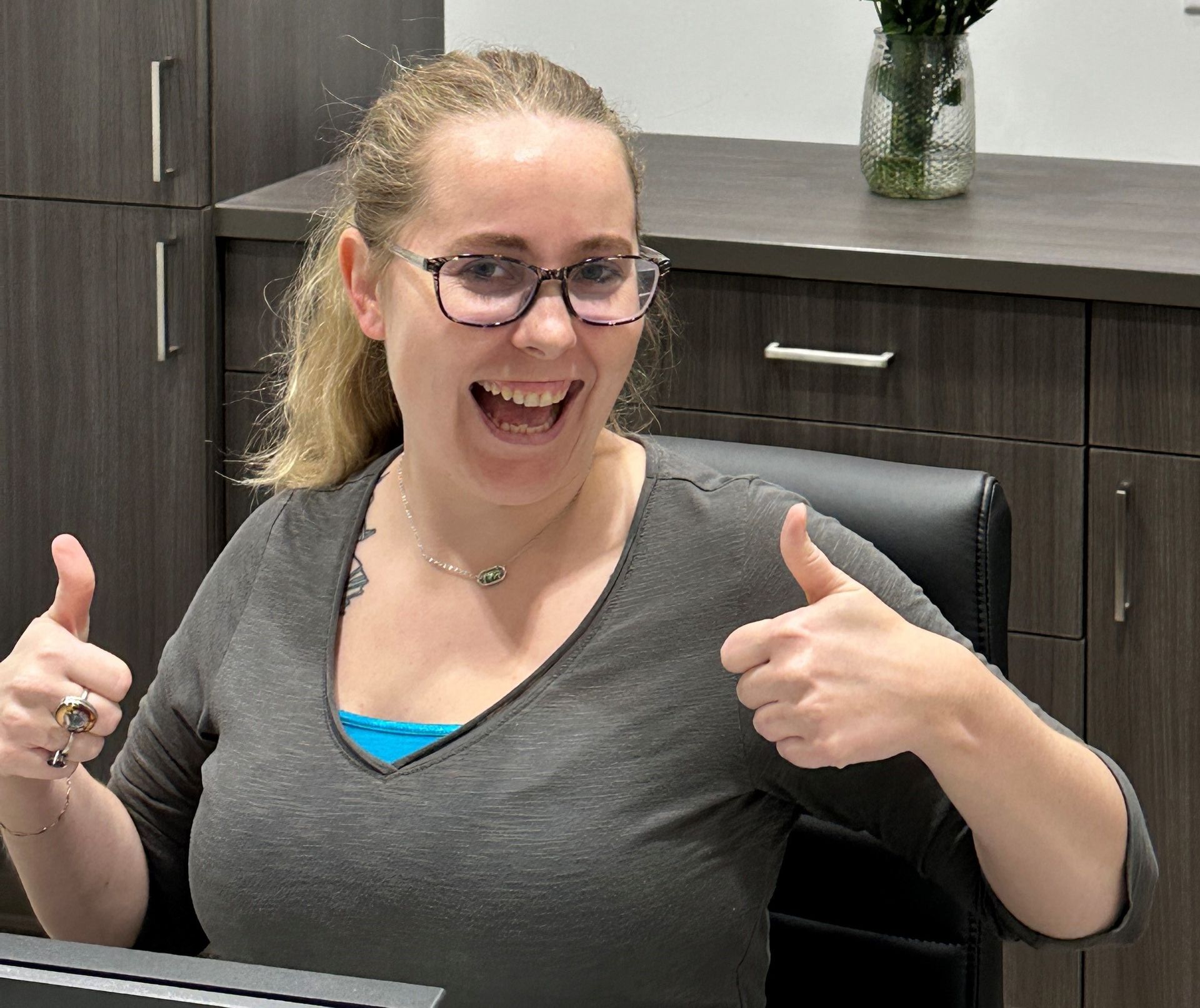 Meet our friendly dental clinic staff in Fairlawn Plaza, Topeka KS. Kayla Smiling | Dental clinic staff from Topeka Smiles, Reed Dental Center | Best dentist for implants.