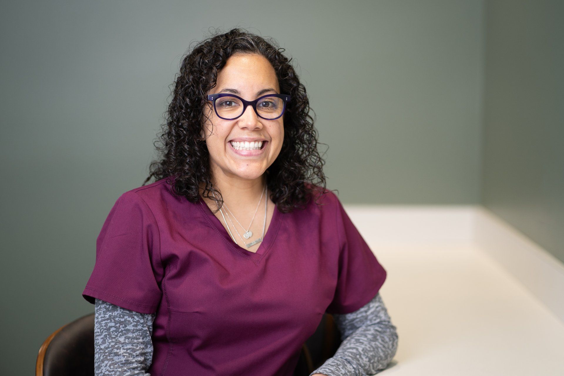 Friendly dental staff in Topeka, KS for affordable emergency dental care and gum disease treatment. Michelle Smiling | Best dental clinic in Fairlawn Plaza, Topeka, KS.