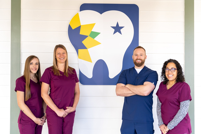 Visit our dental clinic in Topeka, KS near Crestview Park. Reed Dental Center Staff | Top dentist for root canals, whitening, and veneers | Topeka Smiles