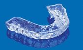 Stop damage to your teeth while sleeping with professional night guards | Topeka KS Clear night guard | protect your teeth from grinding with professional night guards.