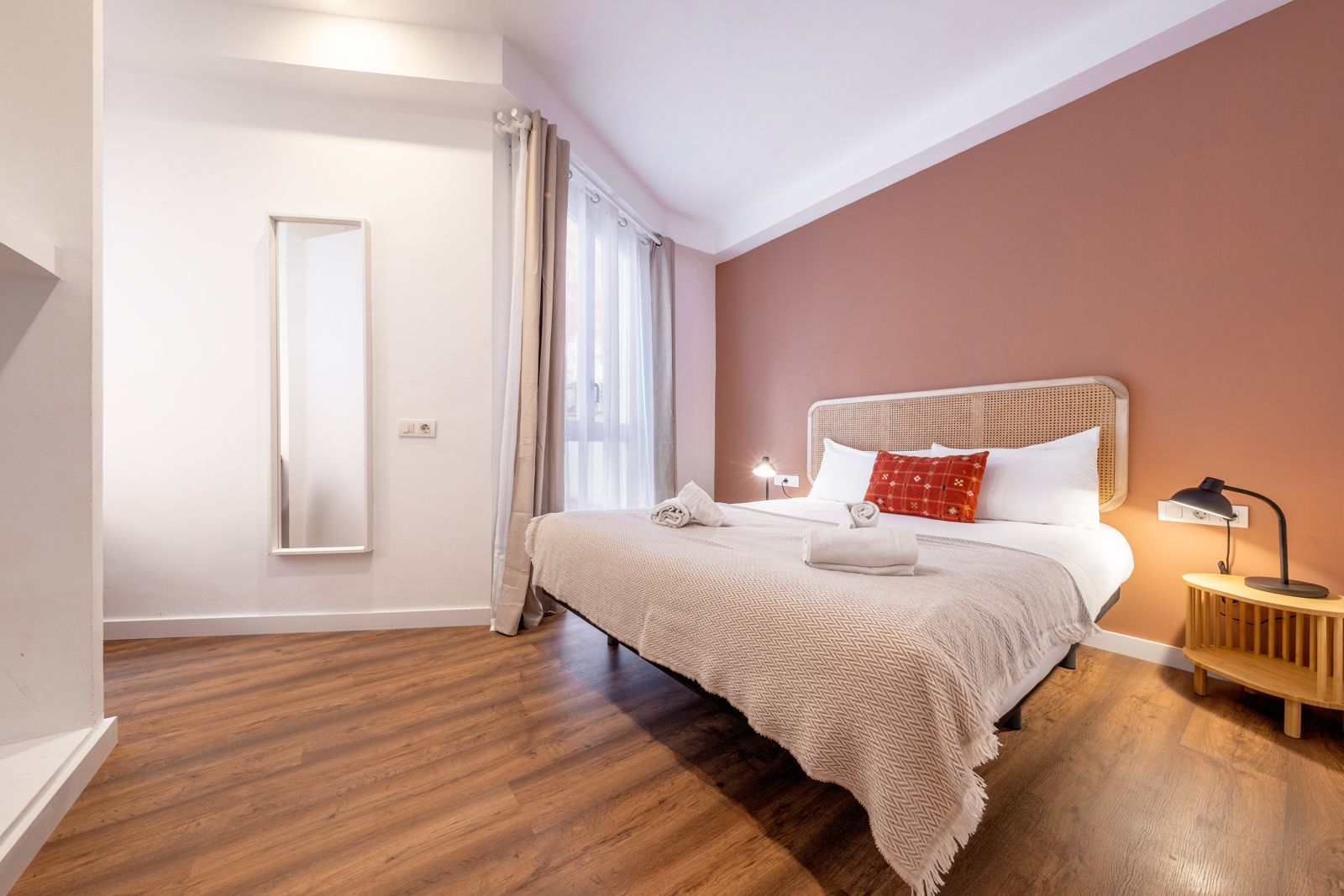 There is a large bed in the middle of the room.