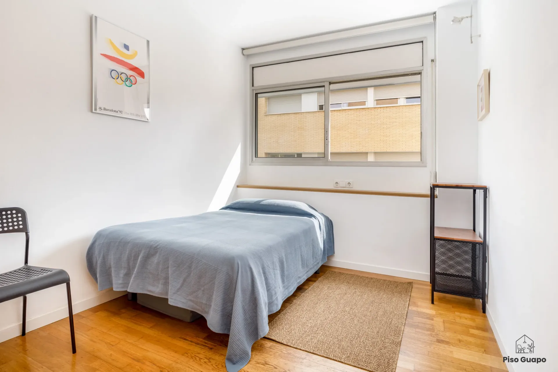 Fotografía inmobiliaria de dormitorio individual en Barcelona