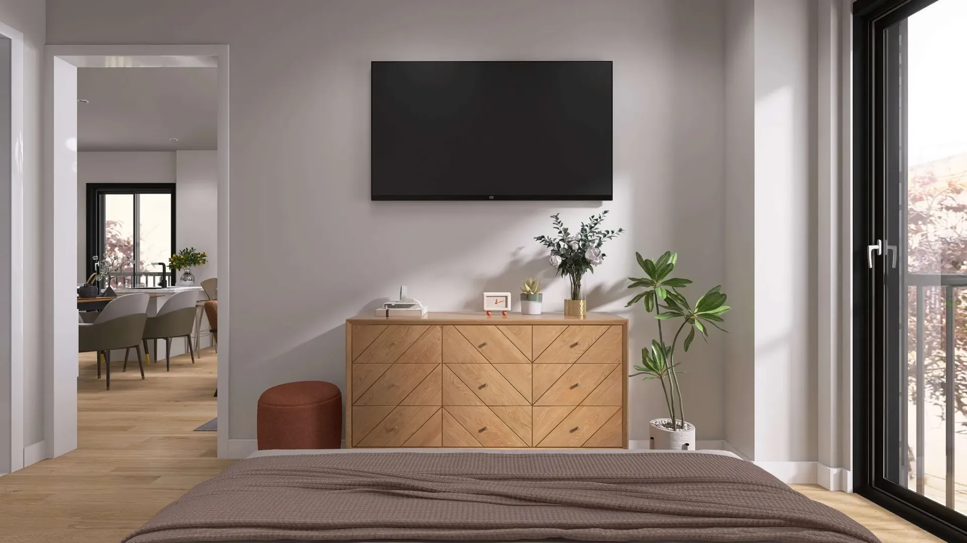 Render inmobiliario de dormitorio principal con televisión y cómoda de madera