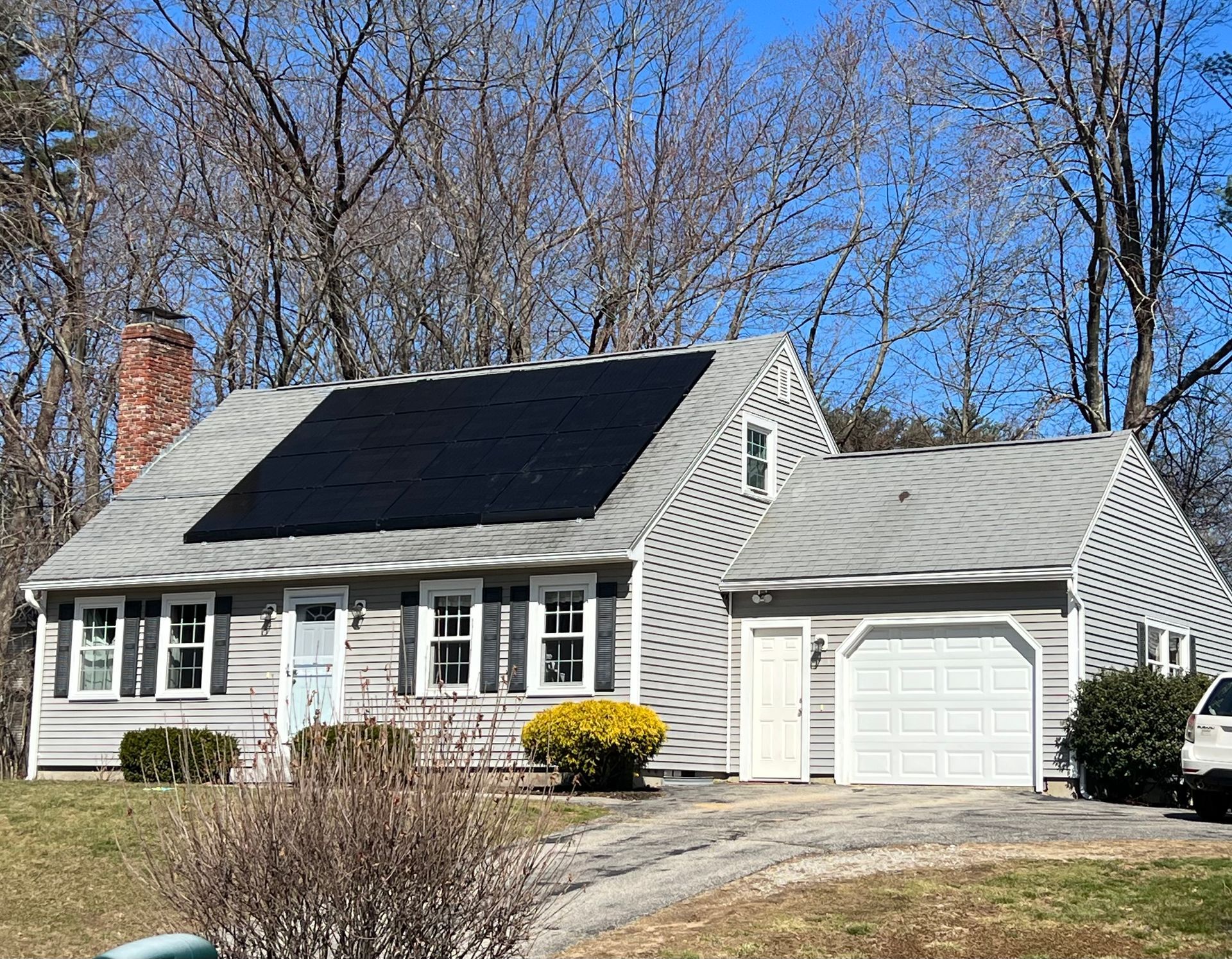 NH home equipped with solar panels financed through a flexible payment plan