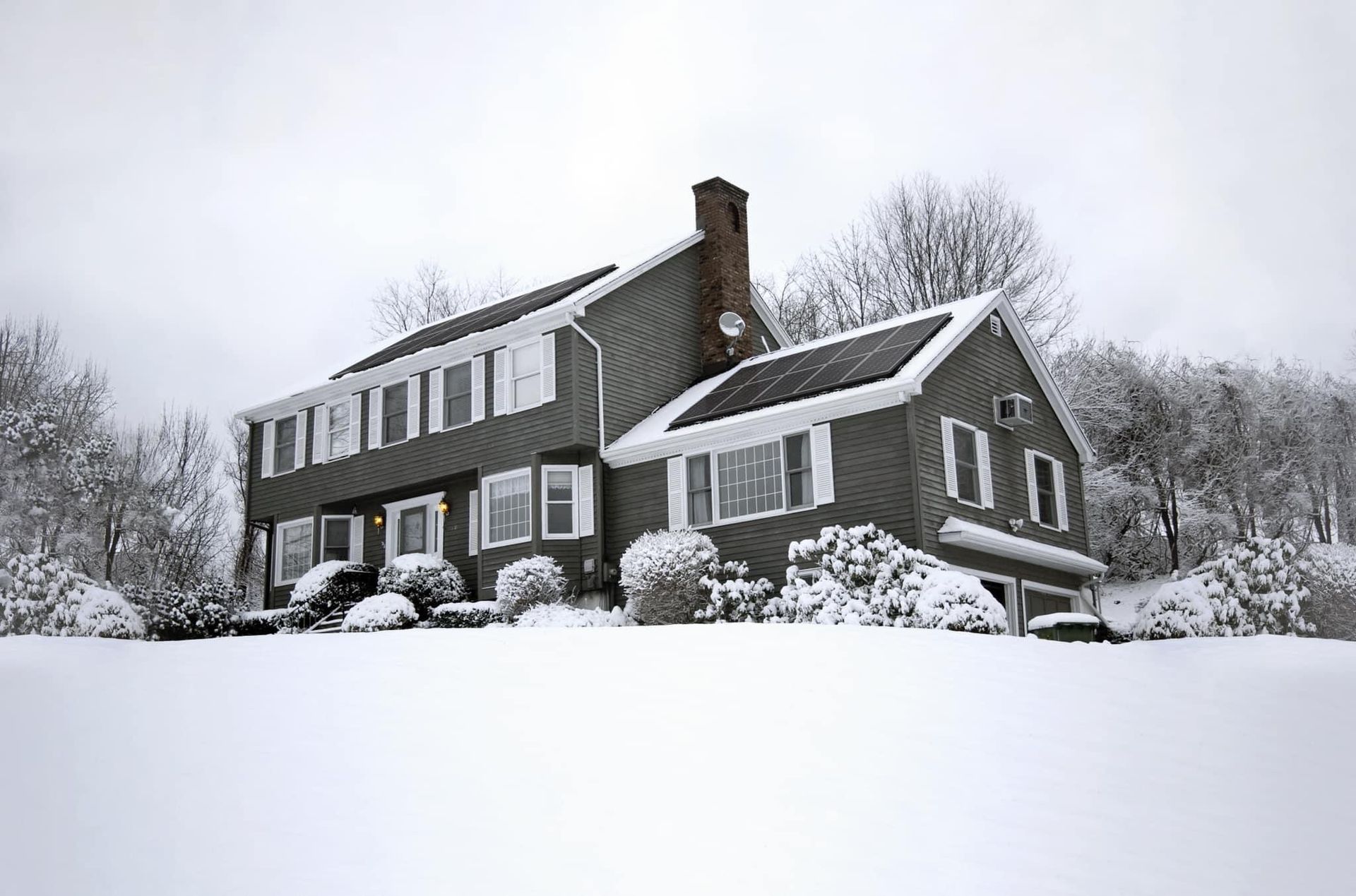 Merrimack Solar FAQ documents open on a desk, ready to answer questions