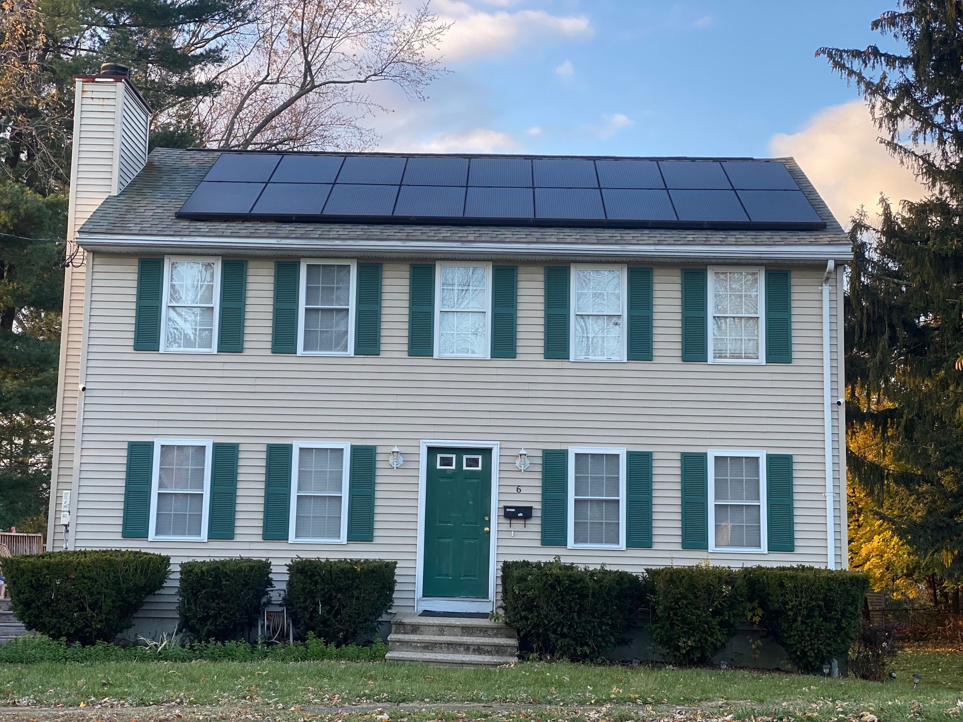 Merrimack Solar advisor reviewing solar loan options with homeowners