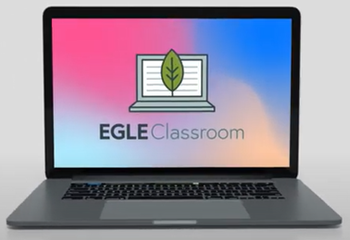 Laptop displaying the EGLE Classroom logo on a pastel gradient screen
