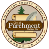 City of Parchment, Michigan circular seal in gold and brown with a scroll and lake scene.