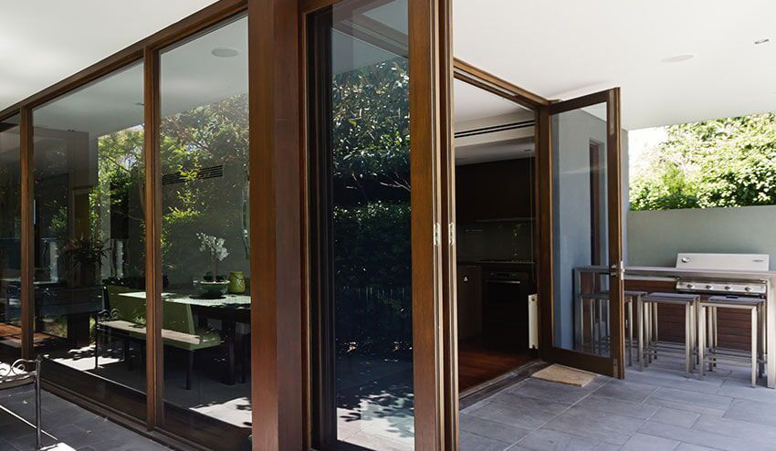 House With A Lot Of Windows And A Patio — Total Glass Solutions NT Pty Ltd in Yarrawonga, NT