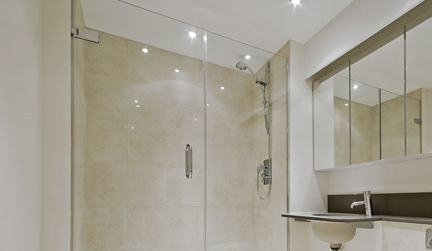 Bathroom With A Walk In Shower, Sink And Mirror — Total Glass Solutions NT Pty Ltd in Yarrawonga, NT