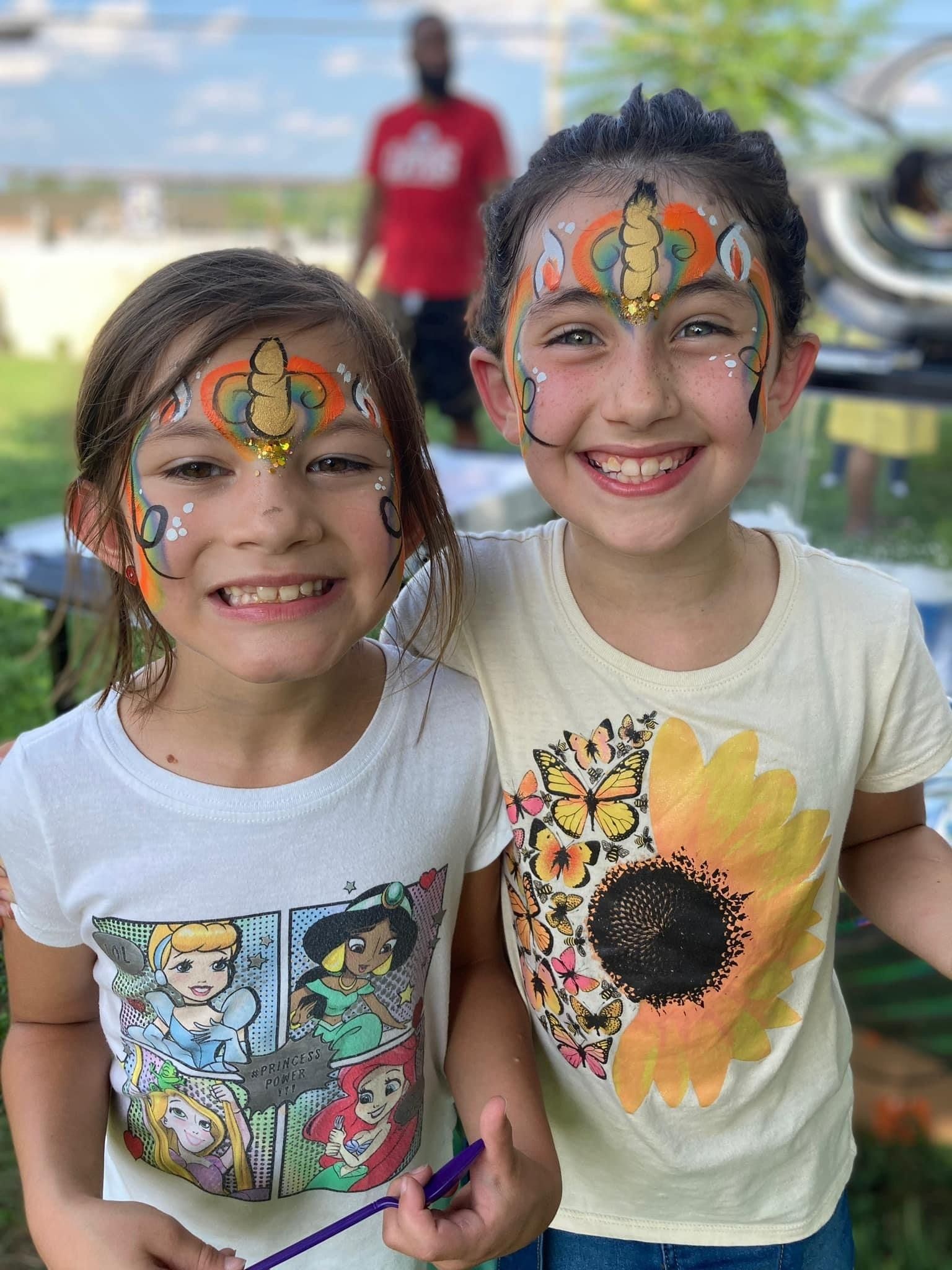 two girls enjoying school outside