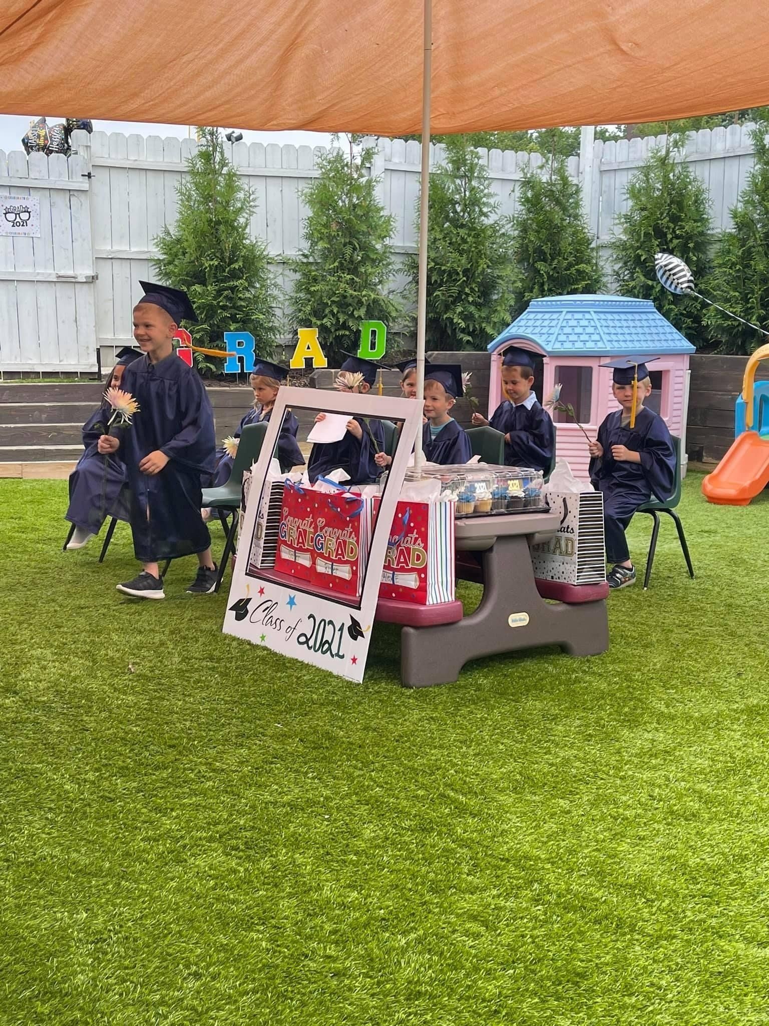 outdoor preschool graduation on the playground