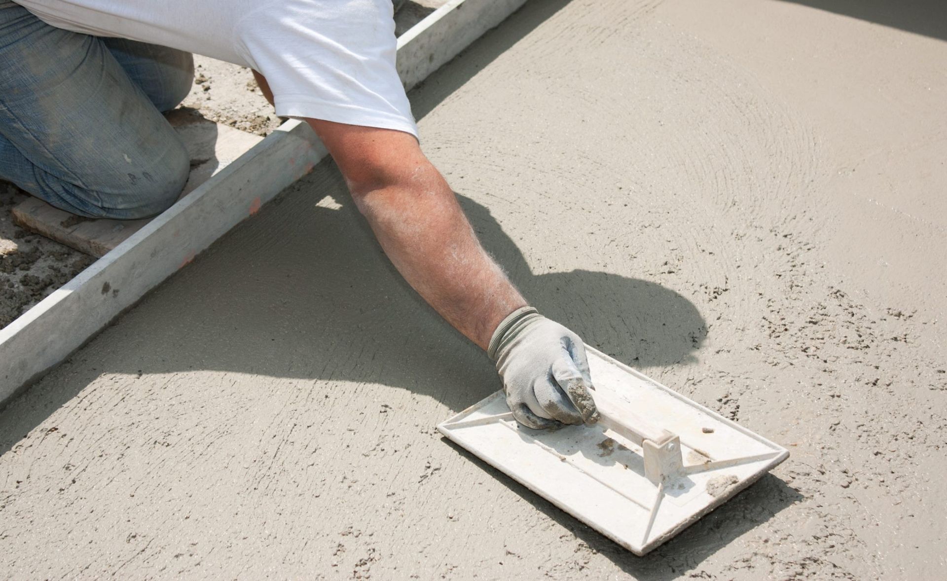 Commercial concrete contractor laying concrete