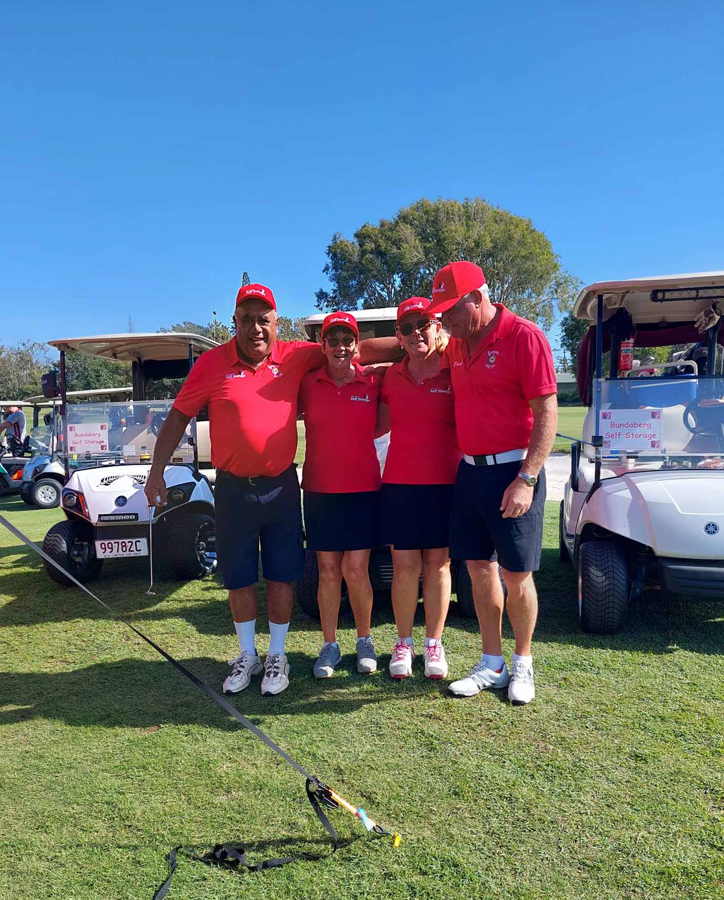 Four person in red uniform | Bundaberg, QLD | Bundaberg Self Storage