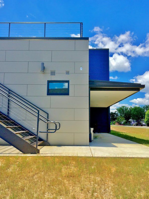 A building with stairs and a window on the side