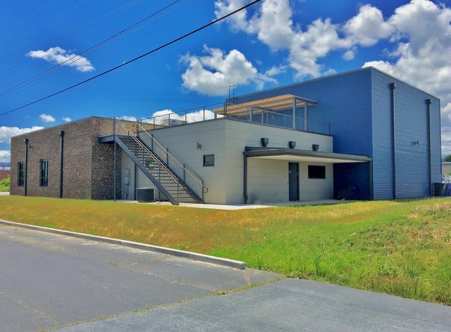A large building with stairs on the side of it