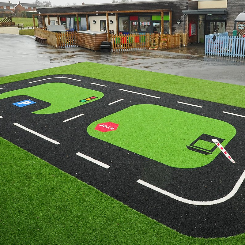 An artificial grass lawn play area in a Ipswich garden