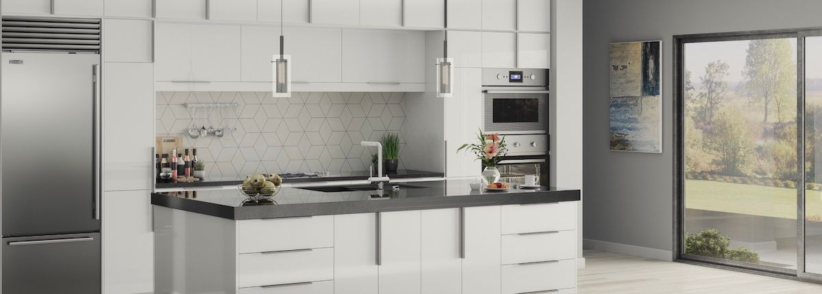 Modern kitchen with white cabinets, stainless steel appliances, and a large window overlooking a green yard.