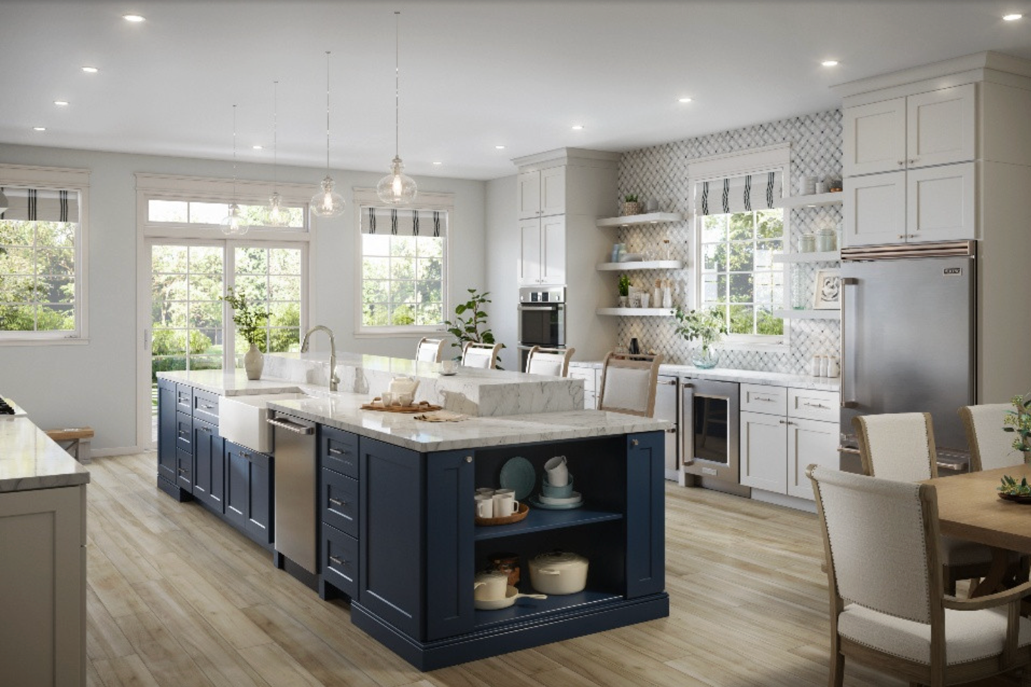 Spacious kitchen with navy island, white cabinets, stainless steel appliances, and light wood floors.