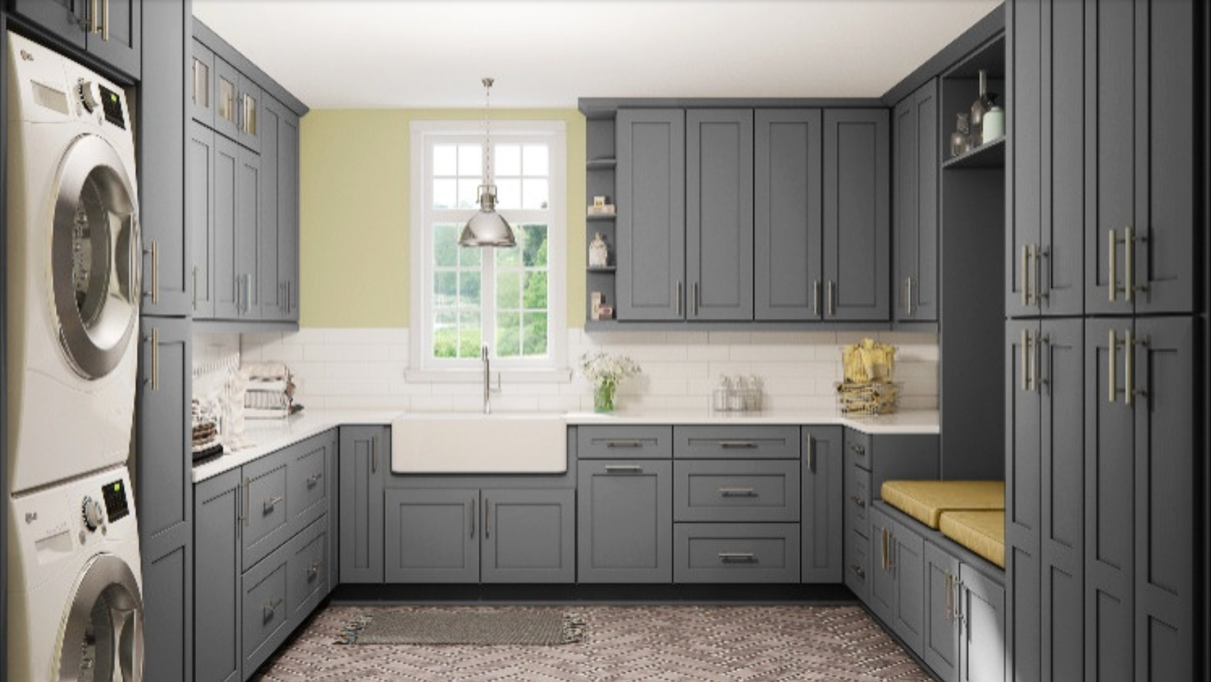 Gray laundry room with cabinetry, white countertops, and a farmhouse sink.
