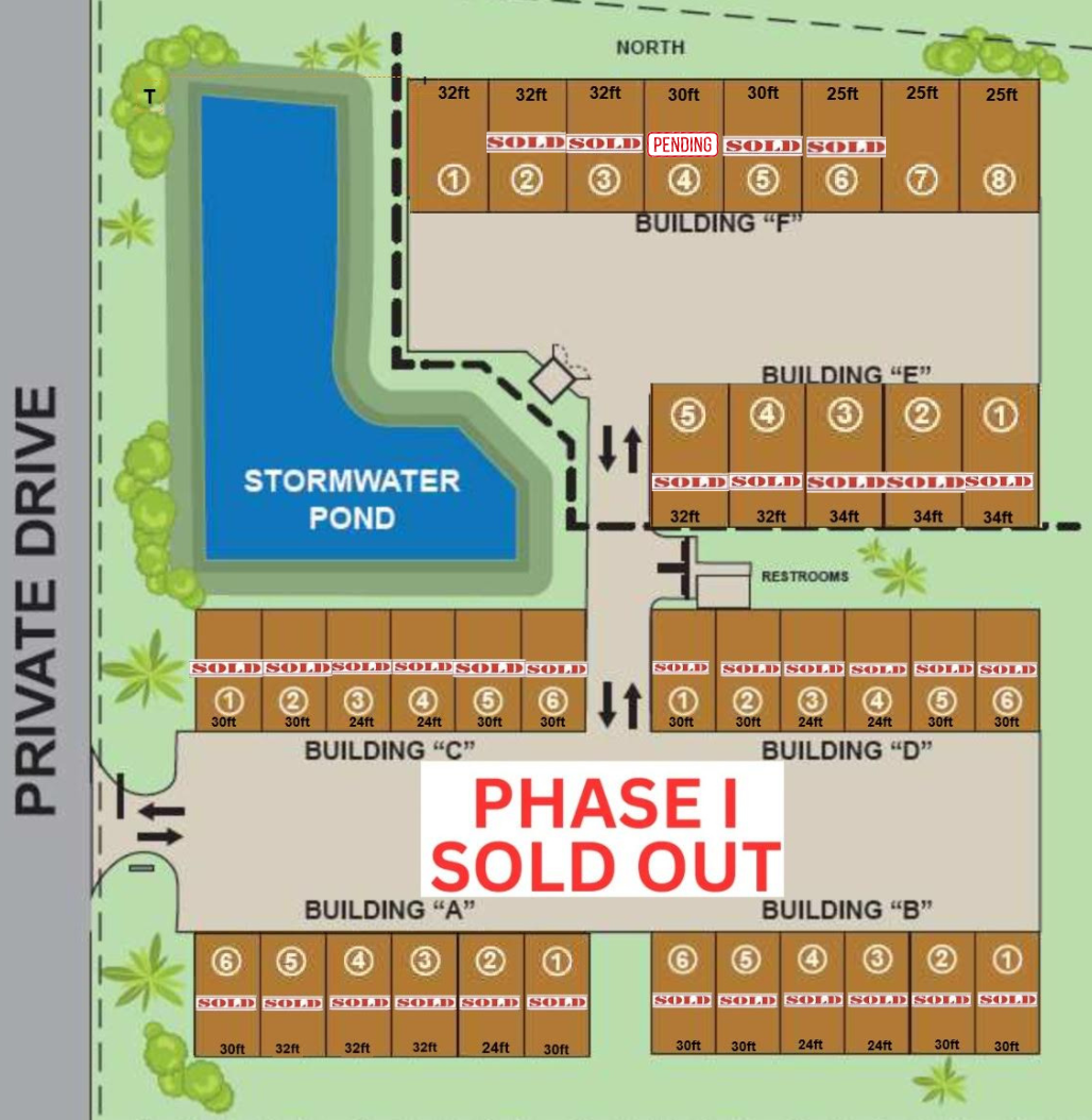 Site plan map with stormwater pond, building lots, and red “PHASE 1 SOLD OUT” label