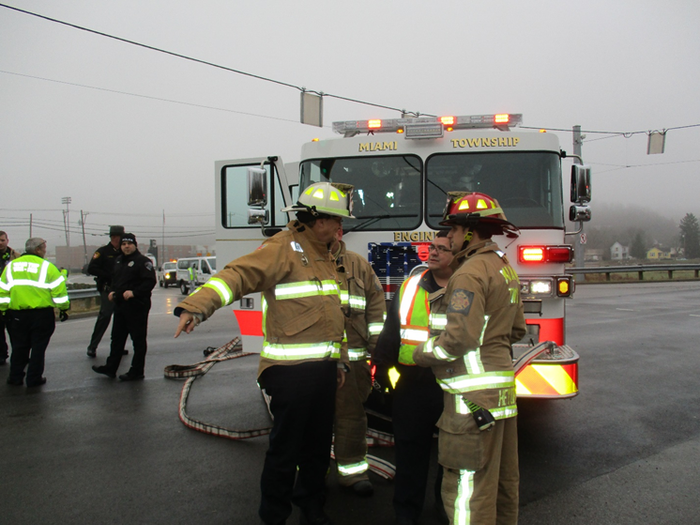 Fire Truck With People Helping — Cincinnati, OH — Kramer & Associates Fire and EMS Consulting Fire Truck With People Helping — Cincinnati, OH — Kramer & Associates Fire and EMS Consulting