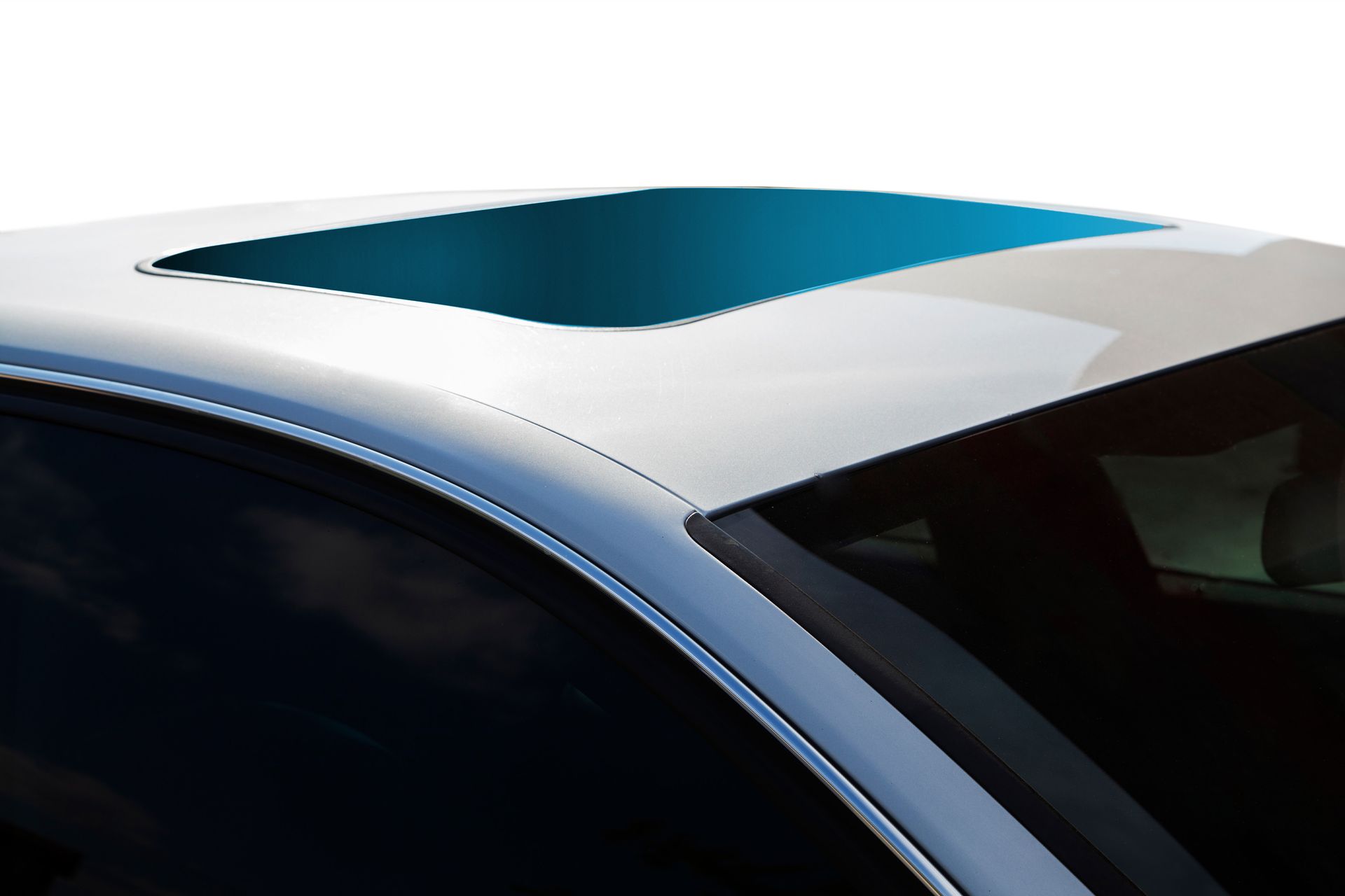 A white car with a blue skylight on the roof