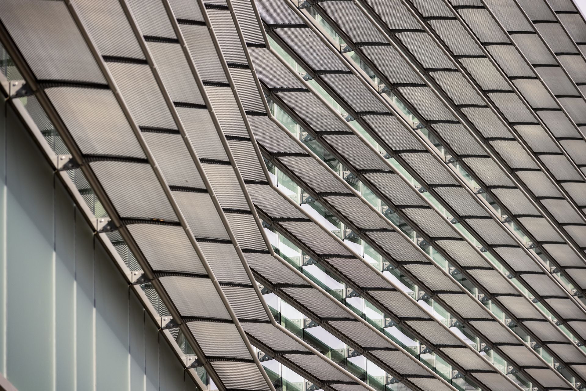 A close up of the roof of a building with a lot of windows.