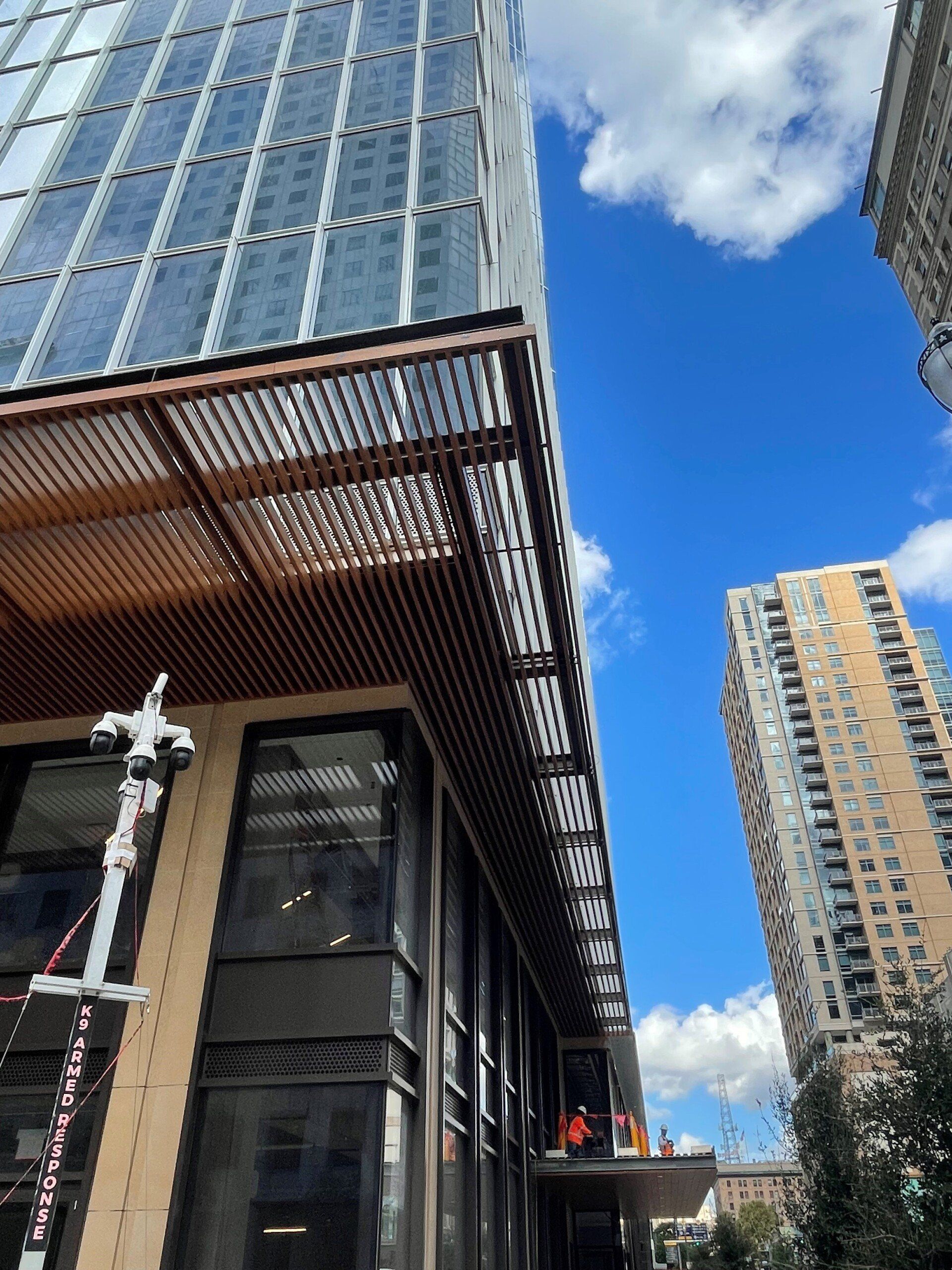 A tall building with a canopy on top of it