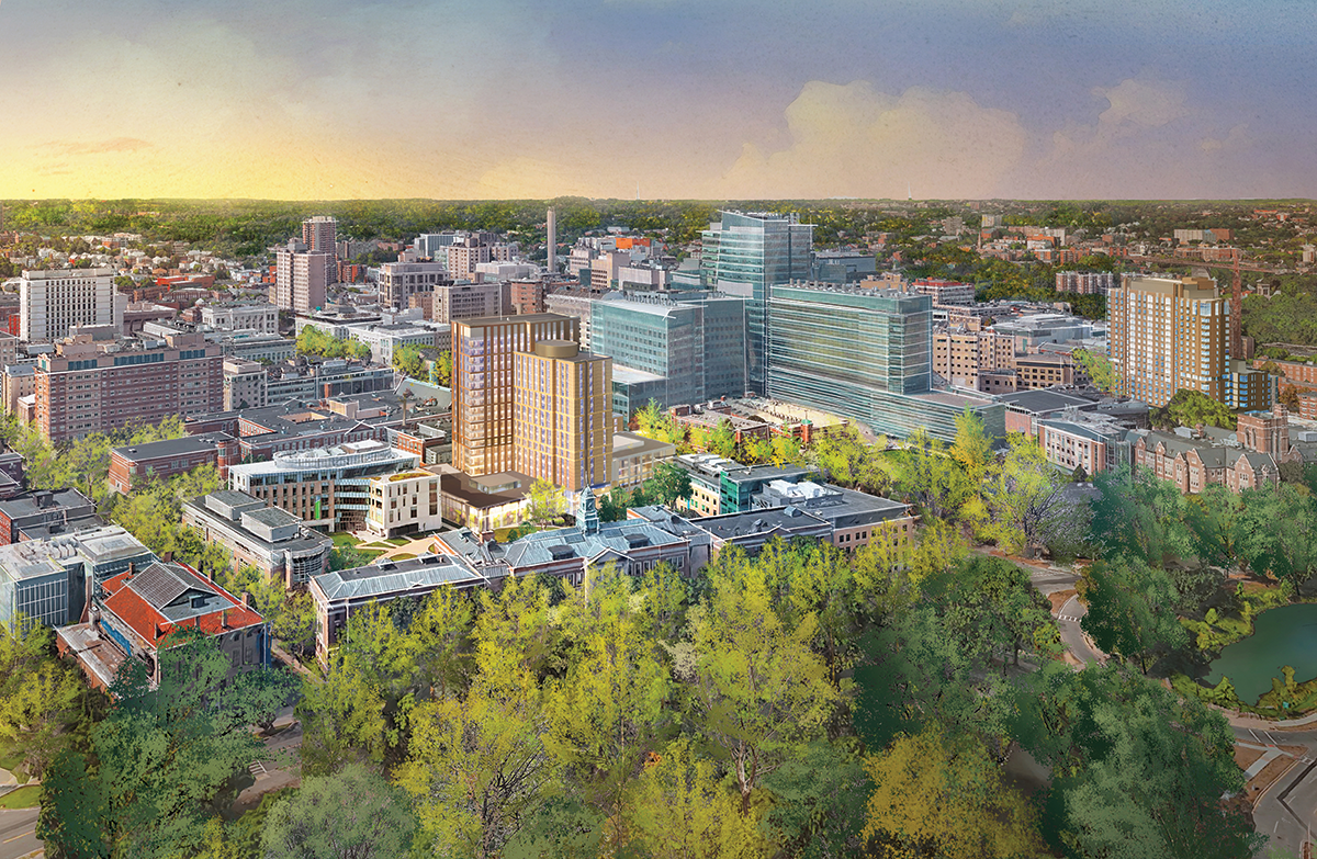 An aerial view of a city surrounded by trees and buildings.